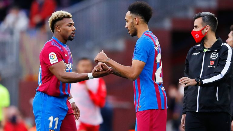 Pierre-Emerick Aubameyang replaces Adama Traore during Barcelona's La Liga match against Atletico Madrid.