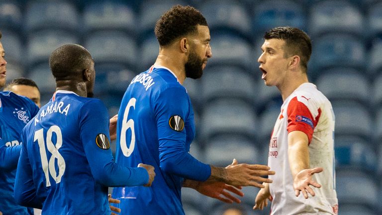 Rangers'  Conor Goldson (left) and Glenn Camara object to something Andrei Kudela Slavia said