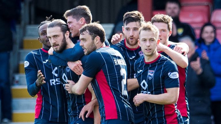 Alex Iakoviti (16) celebrates his goal with his Ross County teammates to make it 1-0 during the Premier League match between Ross County and Hearts at Global Energy Stadium