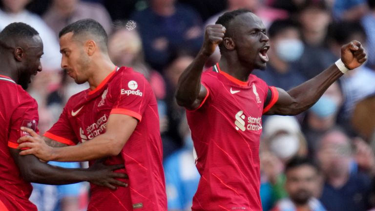 Sadio Mane, Liverpool player, celebrates after scoring his team's third goal