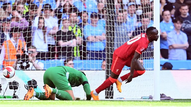 Sadio Mane celebrates after Zach Stephen's error allowed him to put Liverpool 2-0 ahead at Wembley