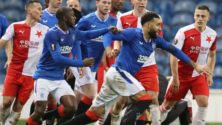 SNS - Rangers & # 39;  Conor Goldson (right) and Glenn Kamara make an exception for something Slavia Under Kudila said during the first leg of their UEFA Europa League Round of 16 first leg match with Slavia Prague in Ibrox. 
