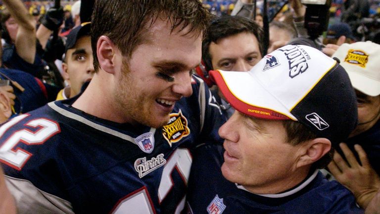 Tom Brady and Patriots head coach Bill Belichick celebrate their victory over Carolina in Super Bowl XXXVIII