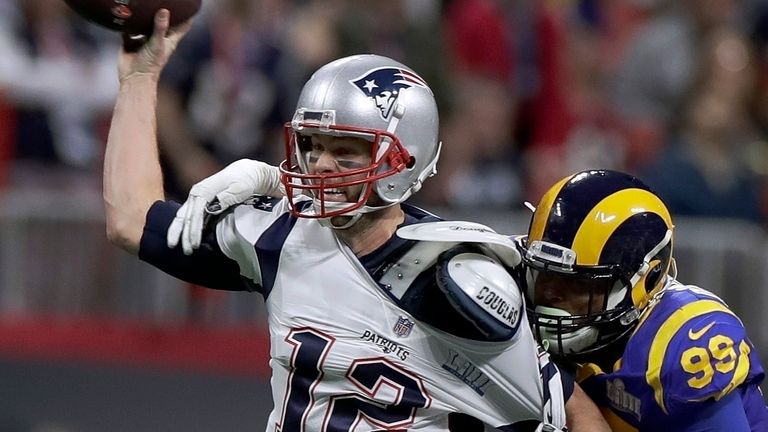 Tom Brady under pressure from Aaron Donald in the Patriots Super Bowl win over the Rams.