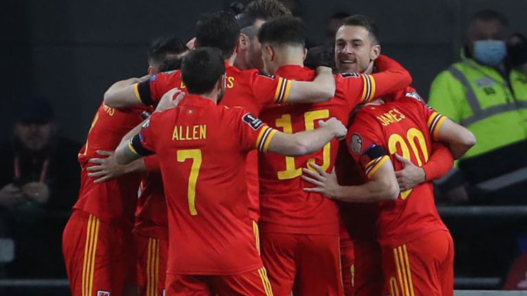 Wales players celebrate after Aaron Ramsey put them first