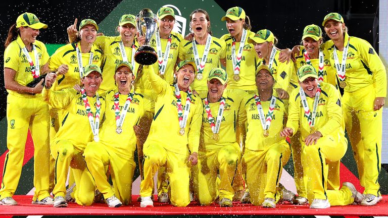 Australia celebrates the trophy after winning the 2023 Women's Cricket World Cup